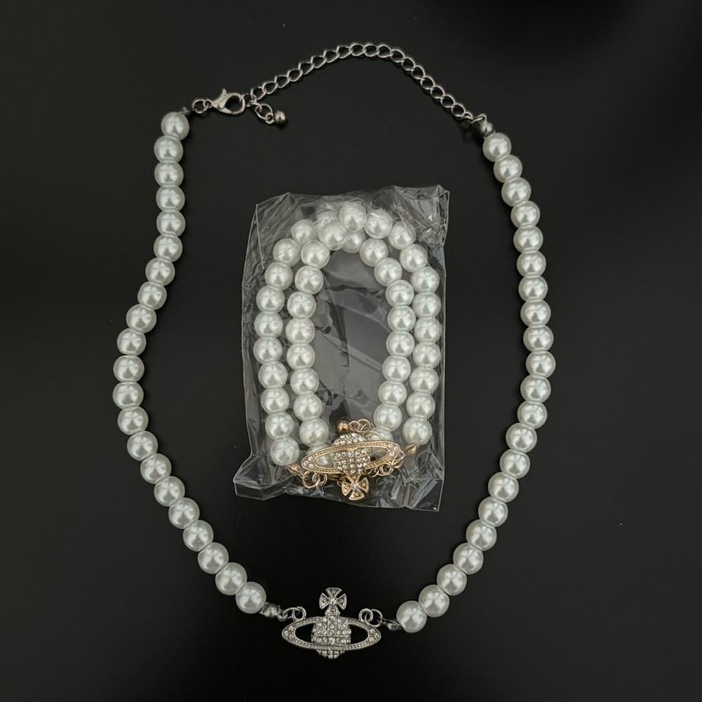 Pearl Saturn necklaces